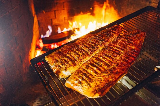 Arctic Day with Ice Fishing and Floating - The Lappish barbecue with salmon: food that makes cold worth it