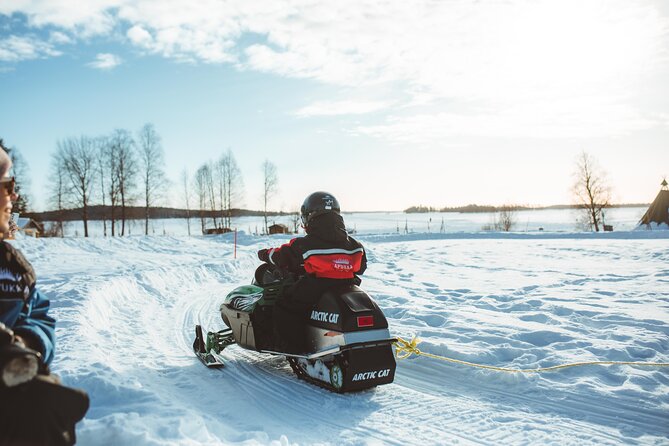 Family Snowmobiling in Rovaniemi, Apukka Resort - Kids in a sleigh first, then mini-snowmobiles in the safe yard