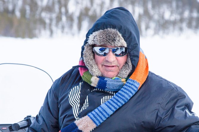 From Ivalo: Ice Fishing Safari to Lake Inari, reindeers & lunch - The Warm-Up Break: Lunch by an Open Fire and Hot Drinks
