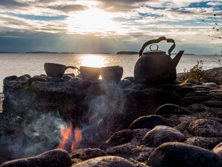 Helsinki: Midnight Sun Kayaking Tour with Campfire - The island campfire break with your own snacks