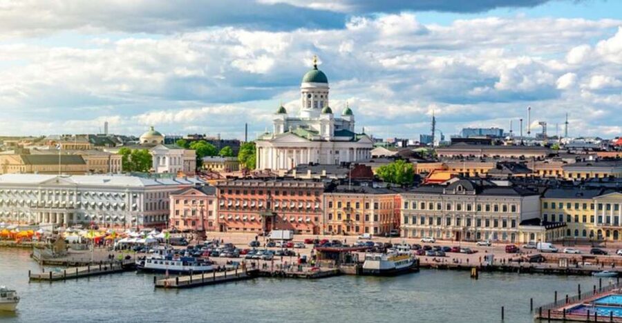 Helsinki: Private Walking Tour with a Local Guide - Old Market energy and church exteriors that teach you how the city breathes