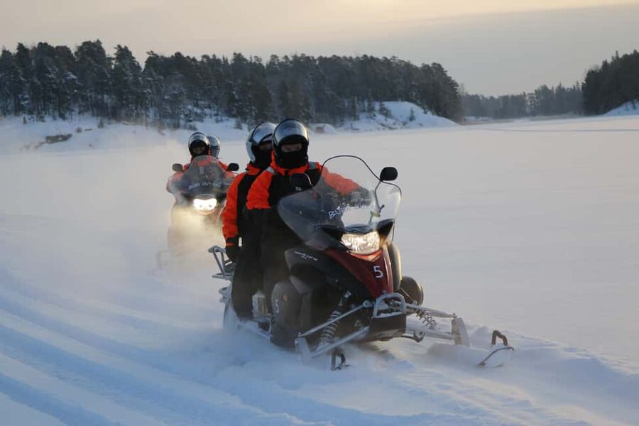 Helsinki: Snowmobile Tour with Lunch and Transfers - Open-Fire Island Lunch: Warm Food, Winter Tools, Real Break Time