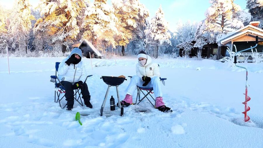 Ice Fishing Adventure in Levi with Salmon Soup - Salmon soup by the fire: comfort food that actually fits the day