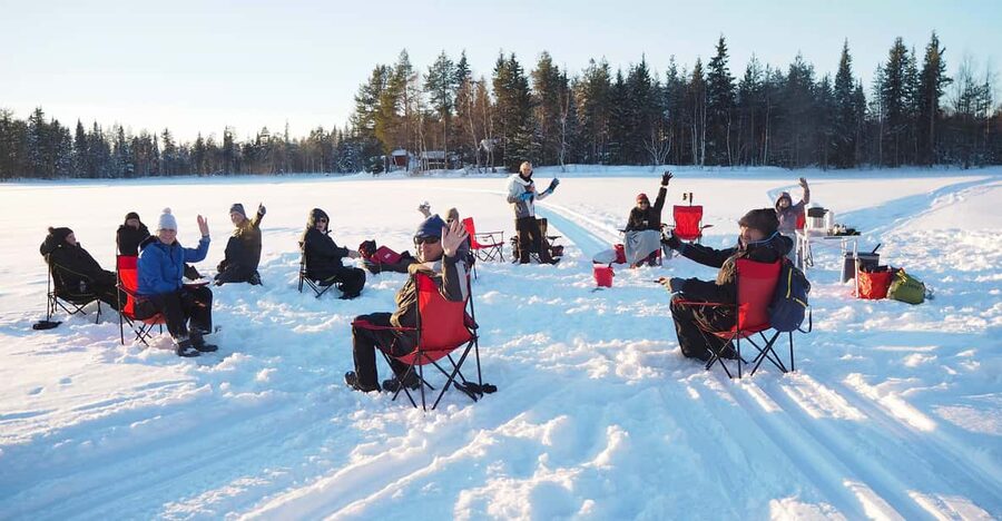 Ice fishing program in Lapland - Fishing time on the frozen lake, calm but hands-on