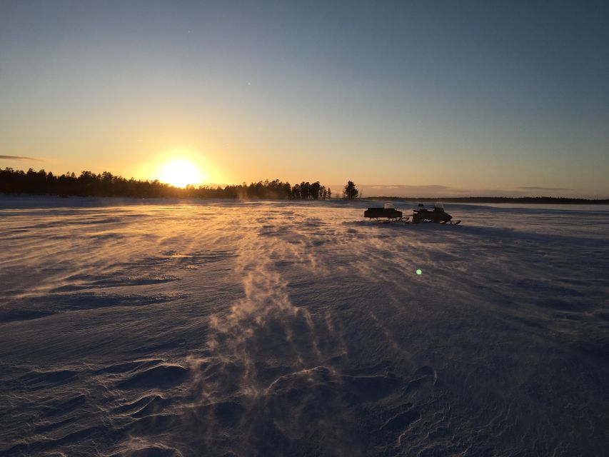 Icefishing and tasting in Lake Inari - From Sámi Village Nellim to the ice, the short snowmobile ride that sets the mood