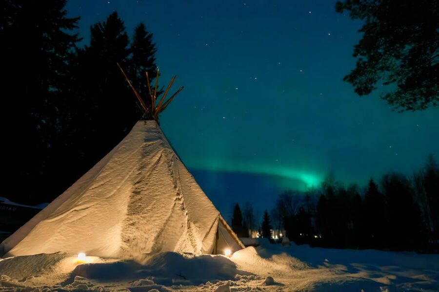 Ii: Snowmobile sleigh trip on frozen sea under starlit sky - Who This Lapland Snowmobile Sleigh Trip Is Best For