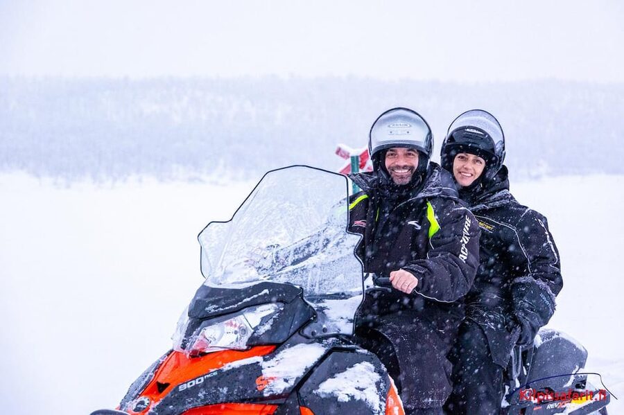 Kilpisjärvi: Border of Three Countries Snowmobile Safari - Koltavuoma yellow cairn: the Finland-Sweden-Norway border stop
