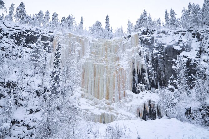 Korouoma Canyon Frozen Waterfalls - Winter gear setup: boots, warm overalls, and traction choices
