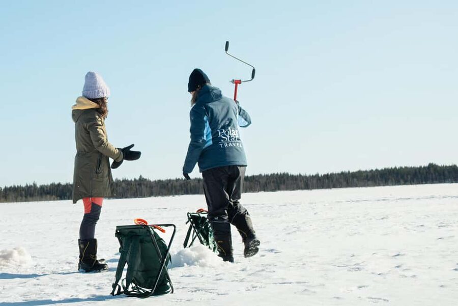 Levi: Arctic Ice-Fishing Experience - Campfire warmth and Lapland snacks: where the tour truly resets