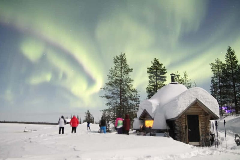 Levi: Evening Snowshoe Walk Under Northern Sky - The hot-hut break: warm drinks, snack, and hands you can actually use