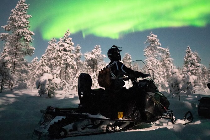 Northern lights safari by snowmobile - The 4-hour adventure loop: gear-up, ride out, aurora break, return