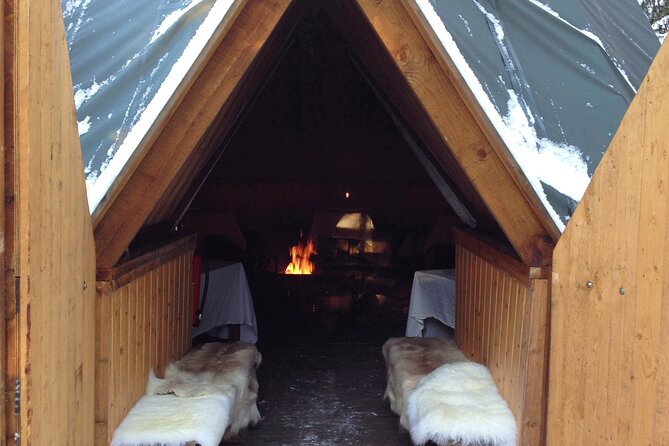 PRIVATE Authentic Reindeer Experience Helsinki - The Finnish kota with warm fire: hot drinks and roasting a bun