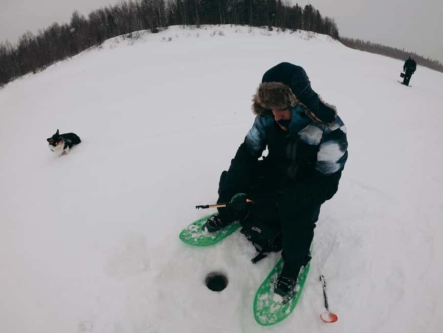 Pyhä: Ice Fishing Experience at Frozen Lake - Waiting by the open fire: warmth, snacks, and a reset for your brain