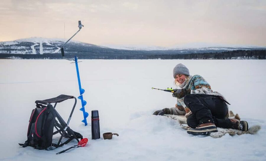 Pyhä: Ice Fishing Experience at Frozen Lake - Where you start at Lucky Ranch Saloon near Pyhätunturi