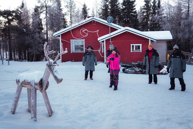 Reindeer Husbandry with Snowmobile Sleigh Ride and Cabin Lunch - Warm clothing rules: jackets and mittens are included, trousers are not