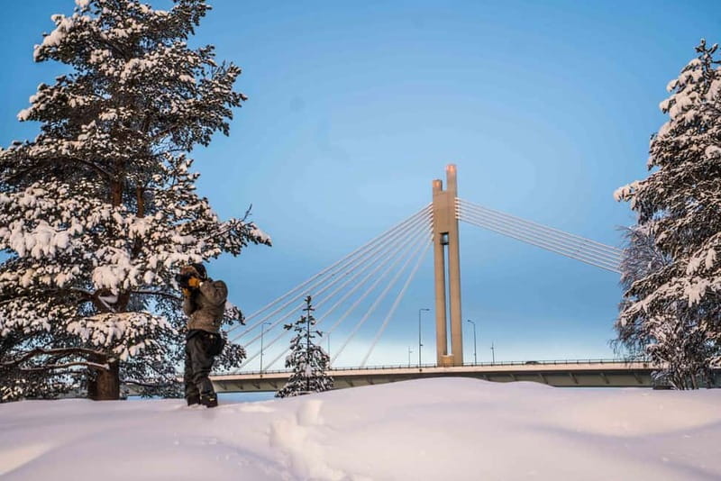 Rovaniemi City Photography Tour - Arktikum Shore: Arctic winter scenes on a frozen river backdrop