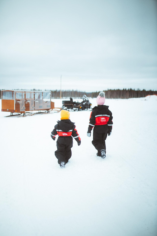 Rovaniemi: Family Snowmobiling Trip - Kids on the heated sled: warm, covered, and safely supervised