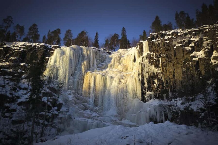 Rovaniemi: Frozen Waterfalls in Korouoma Canyon with Guide - The guided hike through cliffs, rapids, and icy waterfall views