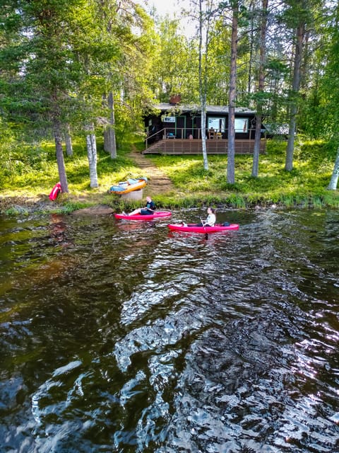 Rovaniemi: Guided Wilderness Kayaking Adventure - Kayaking on Arctic lake water near Rovaniemi