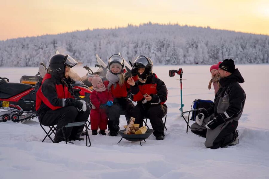 Rovaniemi: Ice Fishing and Snowmobile Tour with Snacks - StayLapland’s Secluded Setup Near Rovaniemi