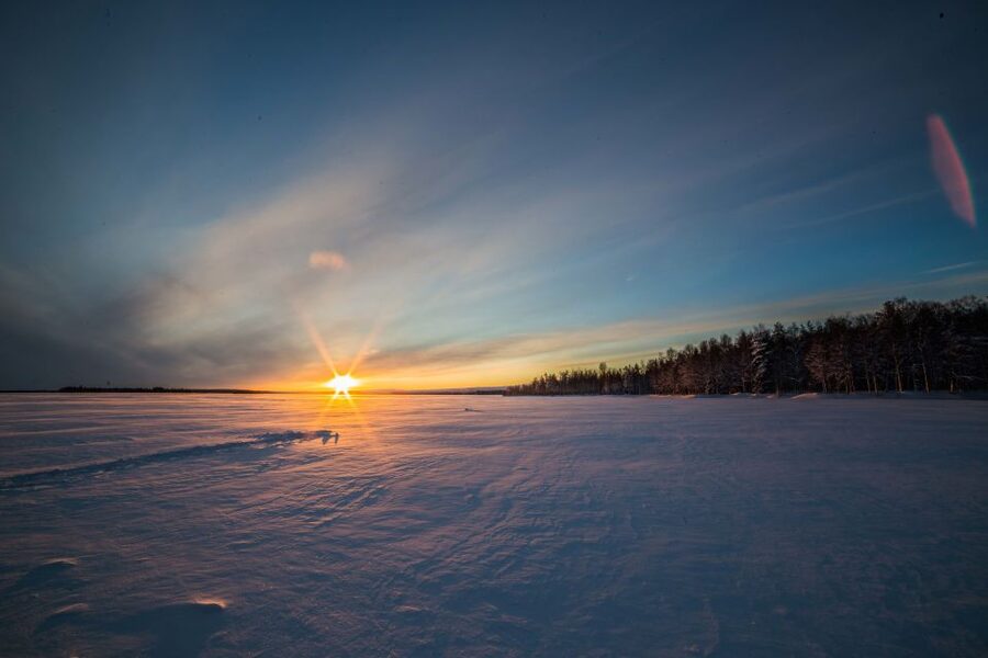 Rovaniemi: Ice Fishing on a Frozen Lake with BBQ and Photos - Getting There From Rovaniemi: Minivan Pickup and a Short Walk to the Lake