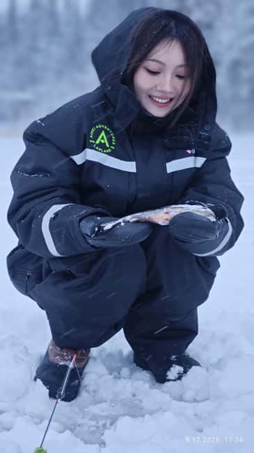 Rovaniemi: Ice Fishing Trip with Snacks and Drinks - Warm overalls, boots, and the little steps that make cold easier