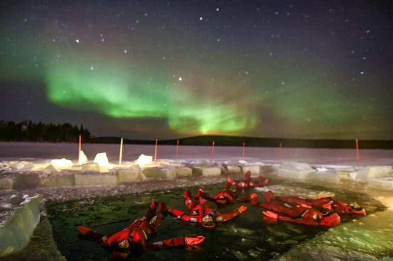 Rovaniemi: Ice Floating in Forest Lake with Aurora Borealis - Suit up: how the insulated floating gear changes the whole trip