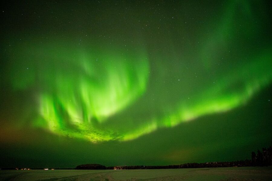 Rovaniemi: Night Sky lappish Barbecue - The campfire wait: hot tea, warmth, and real Arctic quiet