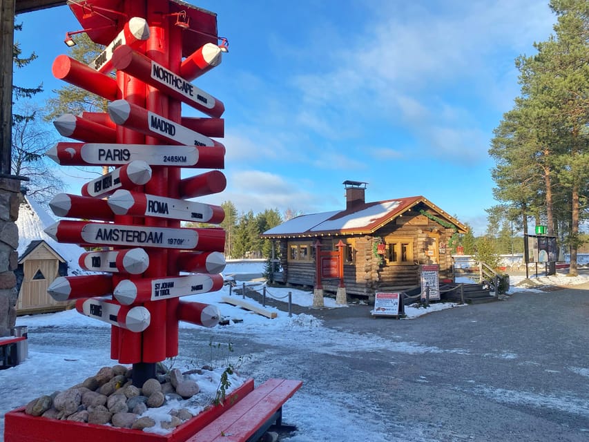 Rovaniemi: Santa Claus Village and Husky sledge/guided tour - Meeting Santa in his office: fun, but plan around the photo line