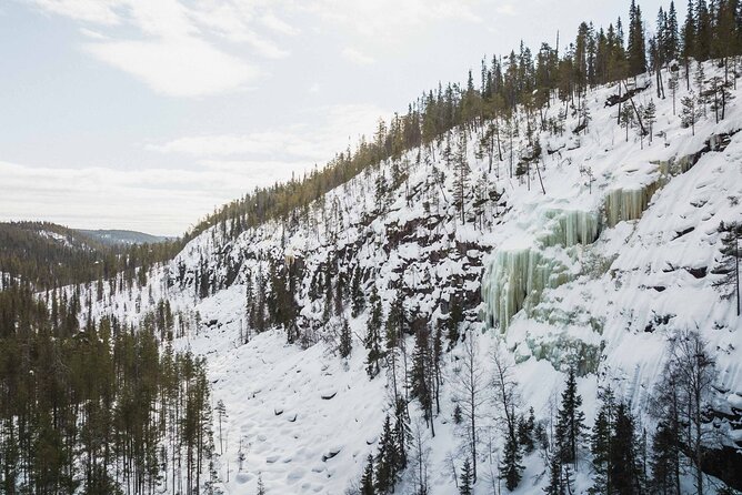 Rovaniemi - Visit to The Frozen Waterfalls of Korouoma - Watching ice climbers while you stay safely on the ground