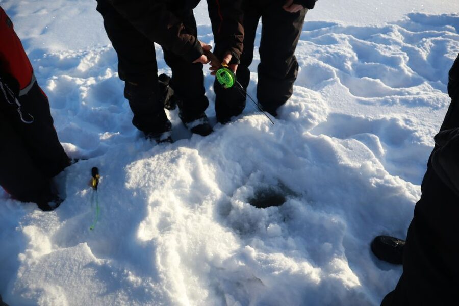 Ruka: Ice fishing trip - The open-fire break: where the trip turns from outdoors to comfort food Finland