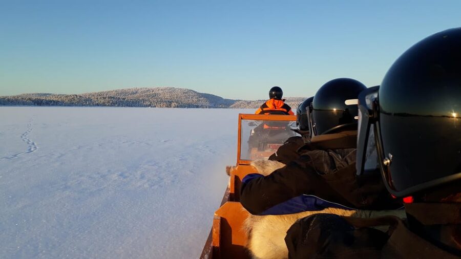 Saariselkä: Ice Fishing Tour to Lake Inari, reindeers& lunch - Koppelo to the ice: sleigh comfort behind a snowmobile