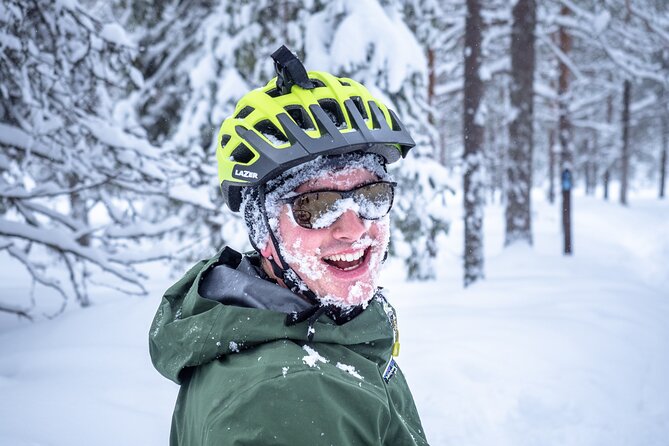 Scenic electric fat bike group ride in Rovaniemi - A Quick Look at Kemijoki, Then the Lumberjack’s Candle Bridge