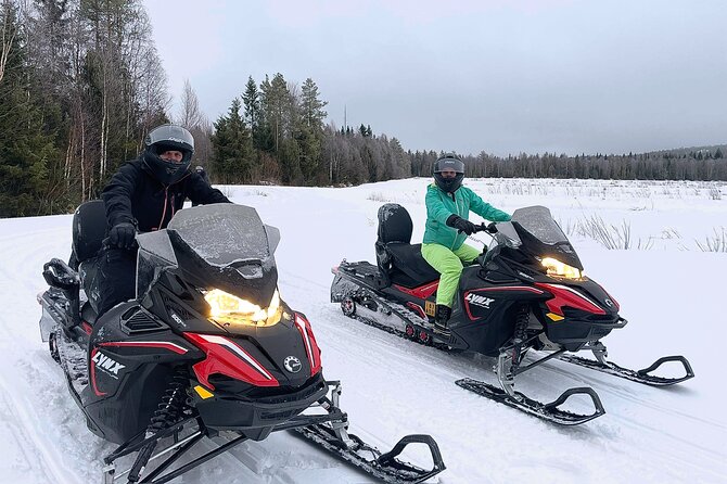 Snowmobile drive experience - The guides behind the good vibes: Pekka, Juho, Jupe, and Juno